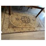 BROWN TONE AREA RUG WITH FRINGE; 59" X 90"