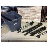 PLASTIC TOTE WITH 4 CAMERA TRIPODS AND MORE