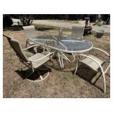 METAL PATIO TABLE WITH A GLASS TOP & 4 CHAIRS