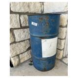 METAL 33 GALLON BARREL WITH A SELECTION OF