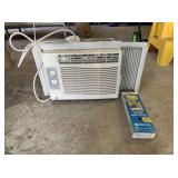 G.E. WINDOW AIR CONDITIONER (USED) WITH AN AIR