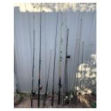 GROUP LOT: 11 VINTAGE FISHING RODS; 8 REELS