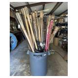 RUBBERMAID BRUTE TRASH CAN FULL OF NATURAL