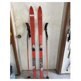 VINTAGE PAIR OF BRIGHT ORANGE TRAK FINLAND WAX-