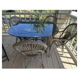 PATIO DINING TABLE WITH GLASS TOP AND 4 RATTAN