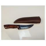 (1) Handled Knife w/ Patterned Blade & Sheath