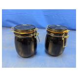 (2) Black Glass Clamp Lid Storage Jars