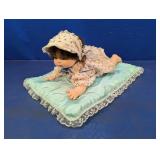 Crawling Baby Doll on Lace Pillow