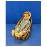 Baby Doll in Wooden Cradle Basket