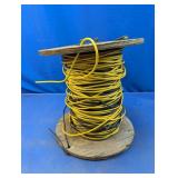 Spool of Yellow & Black Electrical Wire