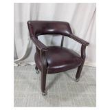 (1) Burgundy Vinyl Office Chair w/ Casters