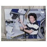 (1) Astronaut Working in Spacecraft Photo Board