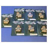 (7) 1997 Porcelain Gingerbread Boy Ornaments
