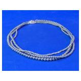 Multi Strand Beaded Necklace With Oval Clasp