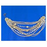 (1) Gold-Tone Multi-Chain Beaded Necklace