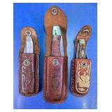 (3) Assorted Folding Knives w/ Sheaths