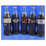 (5) Coca-Cola Commemorative Glass Bottles