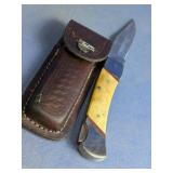 (1) Folding Knife w/ Leather Sheath