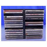 CD Storage Rack with Assorted Music CDs