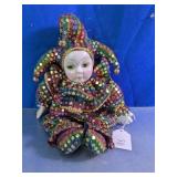 Vtg. Porcelain Jester Doll Rainbow Sequin Costume