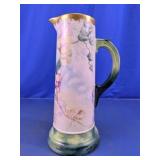 Grape Motif Porcelain Pitcher With Green Handle