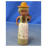 Ceramic Woman Carrying Basket Figurine