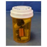 Sewing Thread Spools in Prescription Bottle