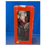 Santa Claus Figurine with Horn & Gift Bag