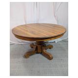 Round Wooden Pedestal Dining Table