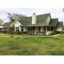 107.75 AC +/- w/home, shop, machine shed & garage