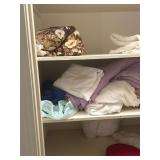Assorted Household Items: Linens, Hat, and Egg Crate
