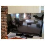 Samsung UHD TV with Remote and Sony DVD/VCR Combo Player