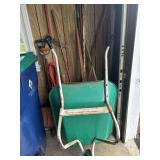 Wheelbarrow with Assorted Garden Tools