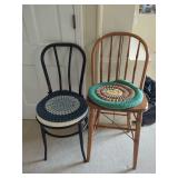 Two Chairs: Spindle Back and Rounded Black with Braided Seat Cushions