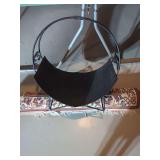 Wrought Iron Firewood Log Holder with Small Oriental Rug