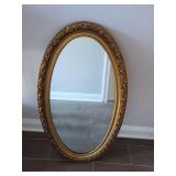 Oval Wall Mirror with Ornate Gold-Tone Frame