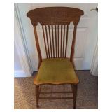 Wood Chair with Carved Back and Green Upholstered Seat