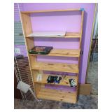 Wood Shelving Unit with Various Items