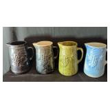 Collection of Grape Motif Pitchers