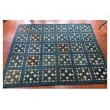 Blue and Tan Quilted Blanket