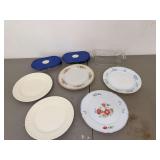 Assorted Kitchenware: Plates, Glass Containers, and Cruet