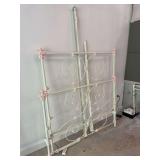 Ornate Metal Bed Frame with Pink Floral Accents