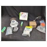 Electrical Parts Assortment: LED Light, Bulb, Breaker, and Hardware