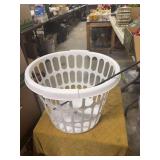 LAUNDRY BASKET AND A SMALL YARD HOOK