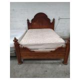 OAK QUEEN SIZE BED - HEADBOARD AND FOOTBOARD WITH RAILS BOX SPRING AND MATTRESS WILL BE GIVEN TO BUYER IF WANTED
