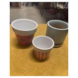 THREE SMALL FLOWER POTS