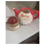 TWO CERAMIC SANTAS.
