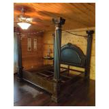Brown Leather Headboard and Wood Frame Canopy Bed