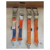 Four Orange Ratchet Tie Down Straps