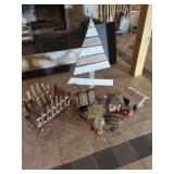 Assorted Garden Decor: Wooden Cart, Bird Feeders, and Metal Art